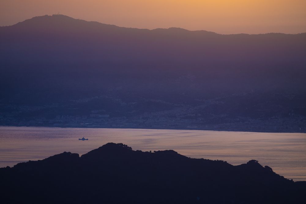 Sunset over the Strait of Messina seen from the beech forest - Photo by Francesco Lemma
